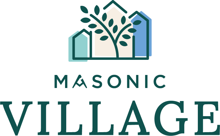 Masonic Village logo with an icon of three homes and an acacia tree in front of them.
